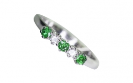 Ring with emeralds and diamonds