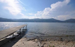 Villa in Ranco with direct access to the lake